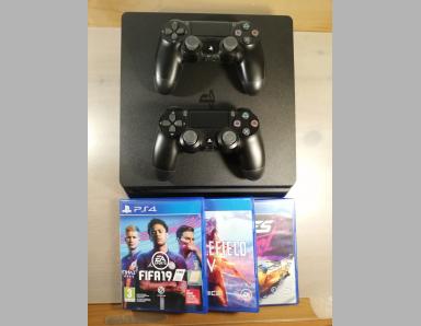 PS4 Slim 1To + 2 manettes Dual Shock + 3 jeux - photo 0