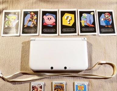 Nintendo 3DSXL + 2 jeux effet 3D et cartes 3D (sans chargeur)  - photo 0